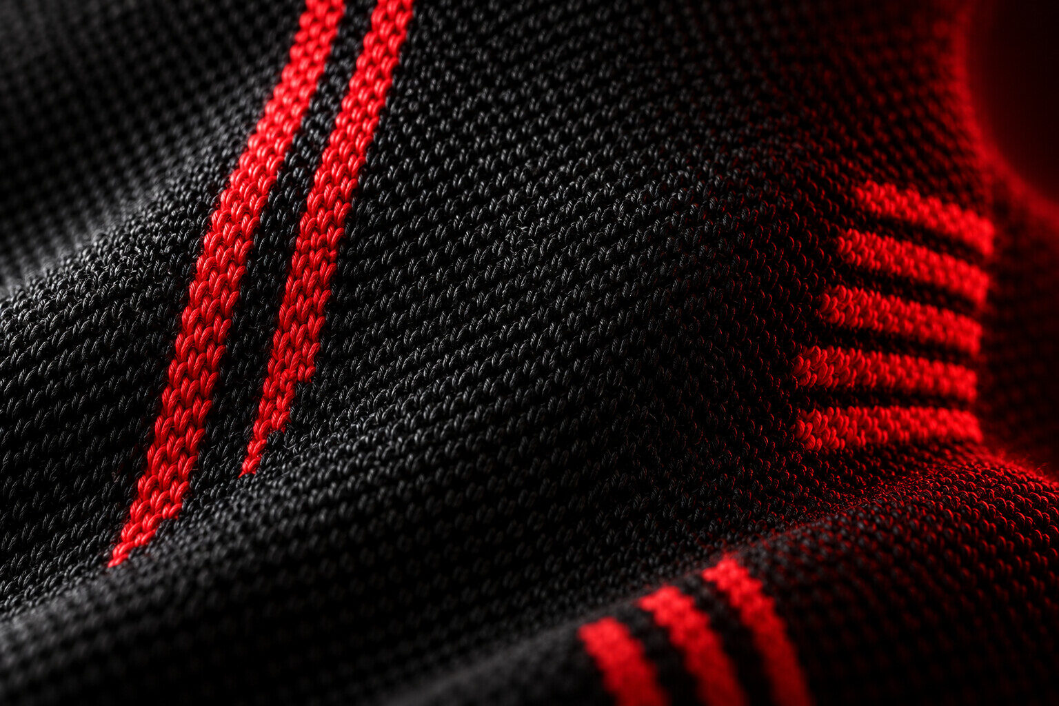 Close-up of red-striped knit fabric
